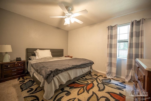 8687 John Hamm Rd, Milton, FL 32583 - carpeted bedroom featuring ceiling fan and baseboards