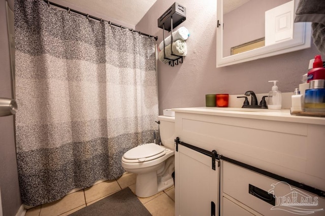 8687 John Hamm Rd, Milton, FL 32583 - full bathroom featuring toilet, tile patterned floors, vanity, and a shower with curtain