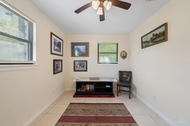 702 Beauvais Rd, Pensacola, FL 32505 - interior space featuring tile patterned floors, ceiling fan, and baseboards