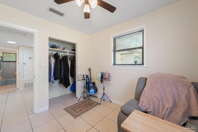 702 Beauvais Rd, Pensacola, FL 32505 - sitting room featuring light tile patterned floors, baseboards, a ceiling fan, and visible vents