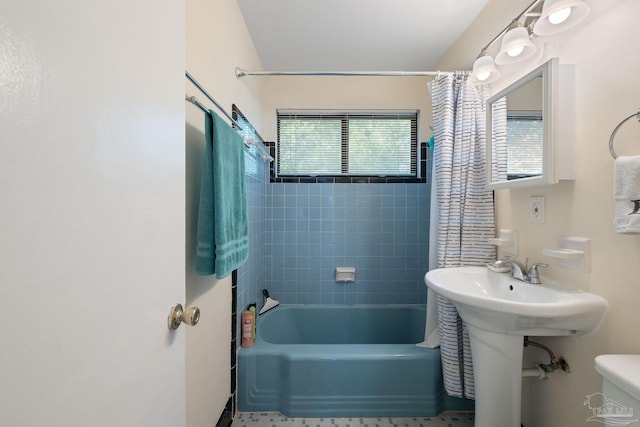 702 Beauvais Rd, Pensacola, FL 32505 - full bathroom with shower / bath combination with curtain and toilet
