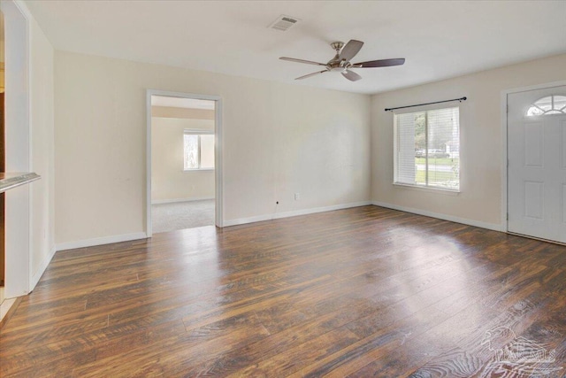 interior space with dark hardwood / wood-style floors and ceiling fan