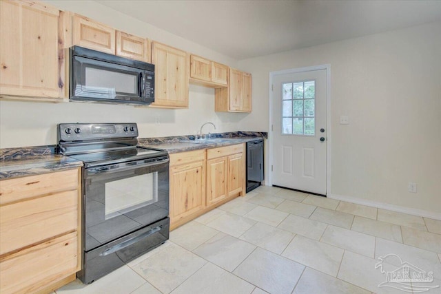 kitchen with light brown cabinets, light tile patterned floors, black appliances, and sink