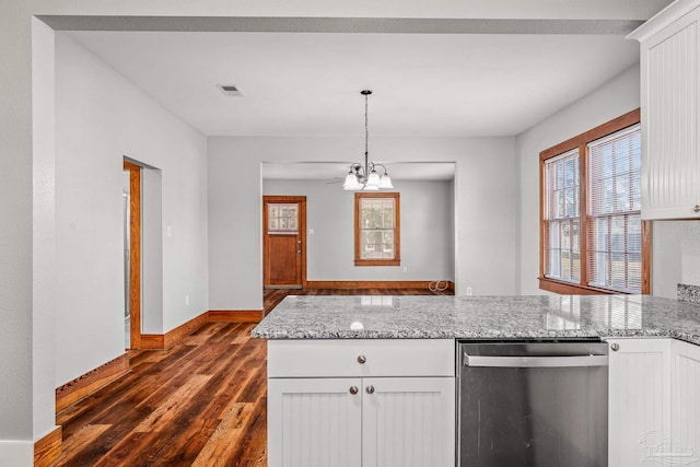 kitchen with visible vents, white cabinets, stainless steel dishwasher, dark wood finished floors, and an inviting chandelier