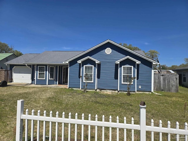 3285 Fairview Dr, Crestview, FL 32539 - ranch-style house featuring an attached garage, a fenced front yard, and a front lawn