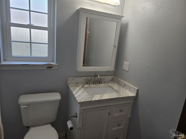 3285 Fairview Dr, Crestview, FL 32539 - half bathroom featuring toilet and vanity