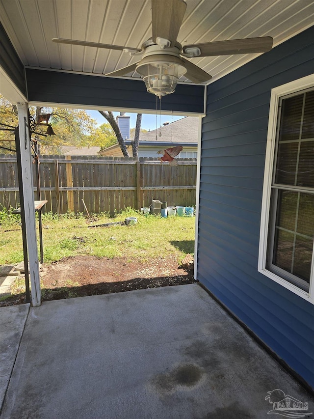 3285 Fairview Dr, Crestview, FL 32539 - view of patio / terrace featuring a ceiling fan and fence