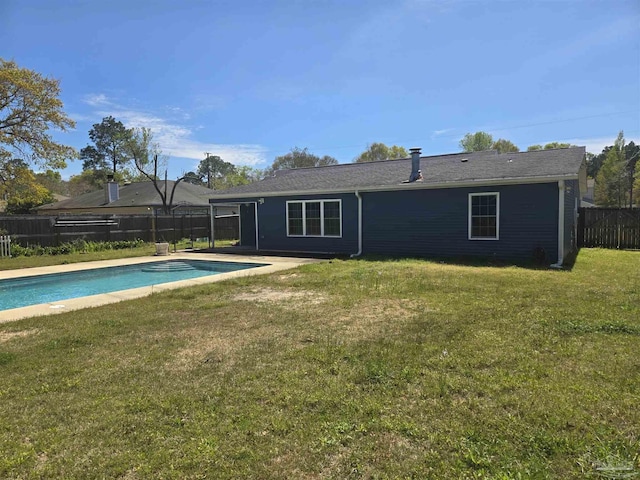 3285 Fairview Dr, Crestview, FL 32539 - rear view of property with a fenced in pool, a fenced backyard, and a yard