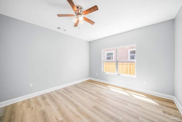 unfurnished room featuring ceiling fan and light hardwood / wood-style floors