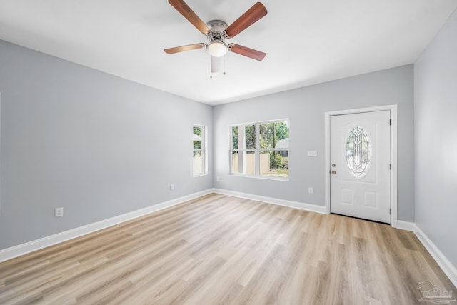 foyer entrance featuring light hardwood / wood-style flooring and ceiling fan