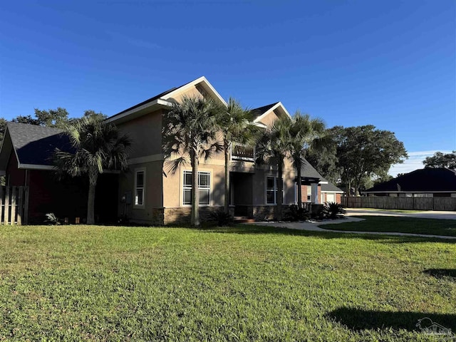 view of home's exterior featuring a lawn