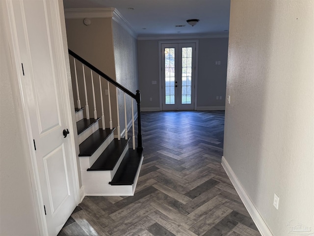 foyer featuring dark parquet flooring, crown molding, and french doors