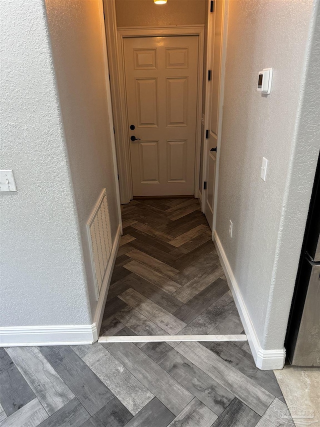 hall featuring hardwood / wood-style floors