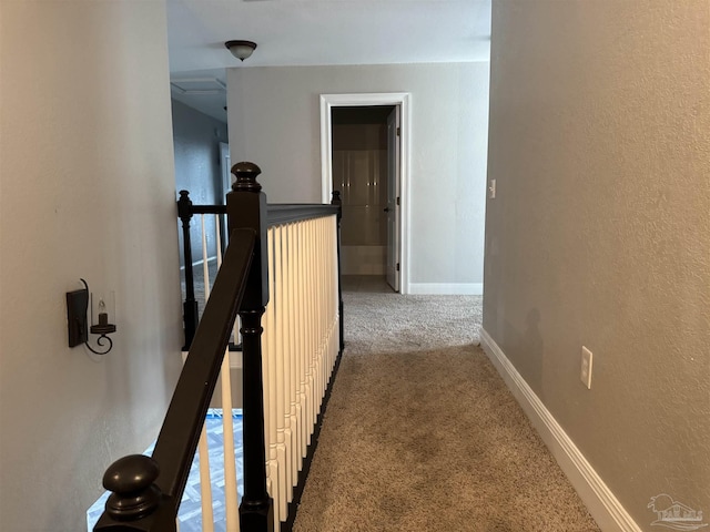 corridor featuring carpet flooring