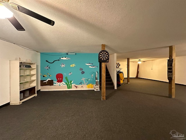 interior space with carpet, a textured ceiling, and ceiling fan