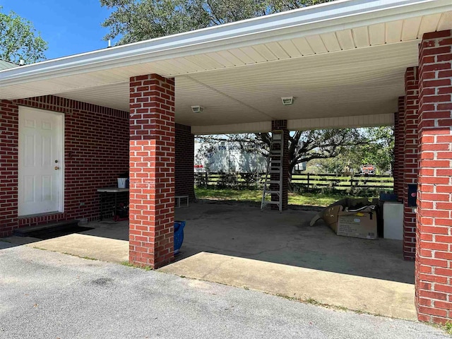 exterior space featuring a carport