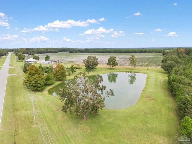 birds eye view of property featuring a rural view and a water view