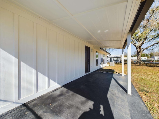 view of patio / terrace featuring a carport