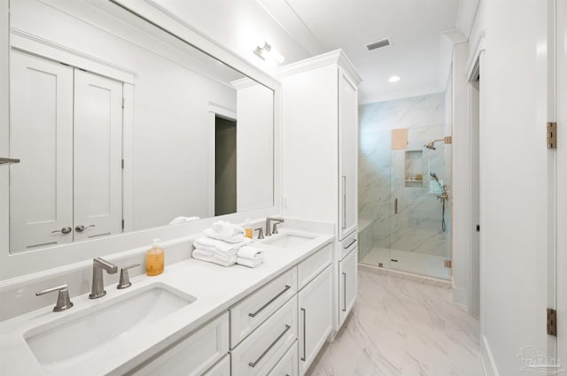 bathroom featuring ornamental molding, vanity, and a shower with shower door