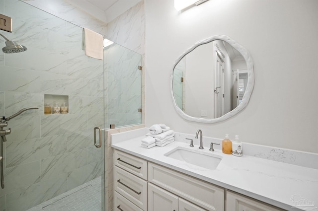 bathroom featuring vanity and walk in shower