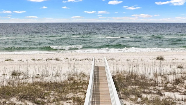 view of water feature with a beach view