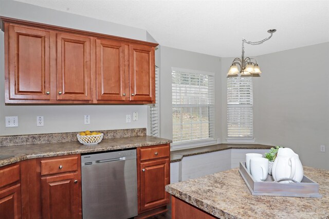 kitchen with a chandelier, brown cabinetry, dishwasher, and hanging light fixtures