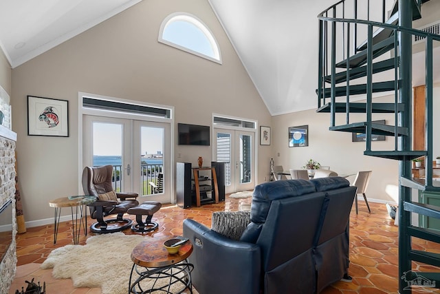 living area featuring high vaulted ceiling, tile patterned flooring, french doors, and baseboards