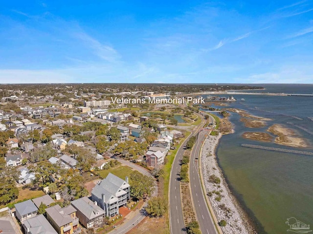 drone / aerial view featuring a residential view and a water view