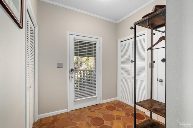 doorway with baseboards and crown molding