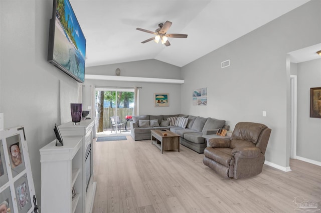 living area with ceiling fan, visible vents, baseboards, vaulted ceiling, and light wood finished floors