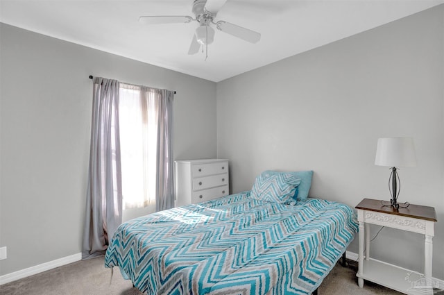 bedroom with carpet floors, ceiling fan, and baseboards