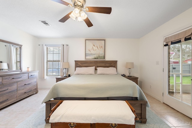 bedroom featuring access to exterior, light tile patterned floors, visible vents, ceiling fan, and baseboards