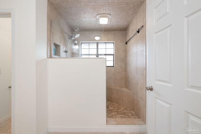 bathroom featuring walk in shower