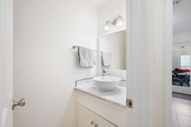 bathroom featuring visible vents and vanity