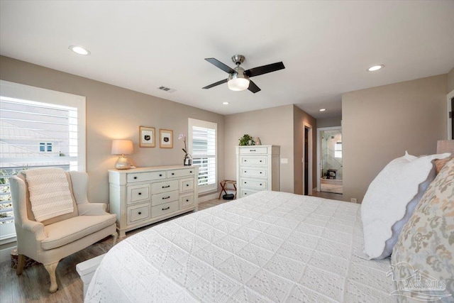 bedroom featuring visible vents, recessed lighting, ceiling fan, and wood finished floors