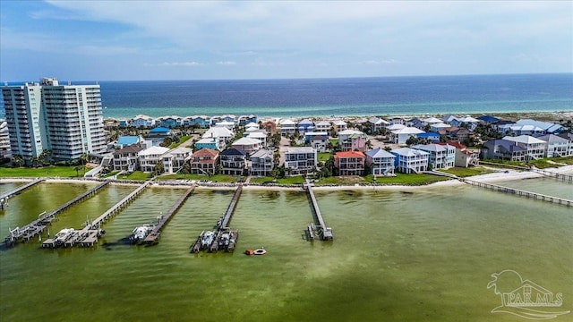 aerial view featuring a residential view and a water view