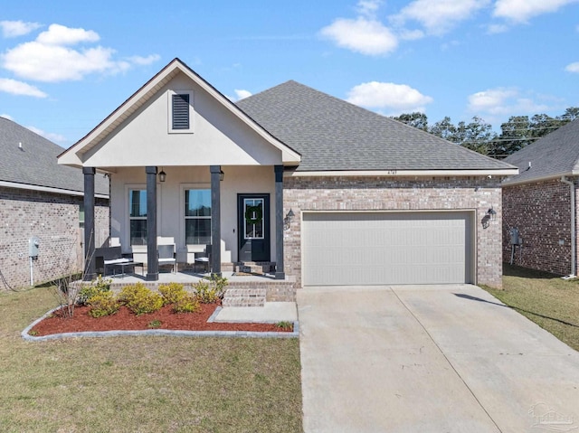 view of front of house featuring a porch, a garage, a shingled roof, driveway, and a front lawn