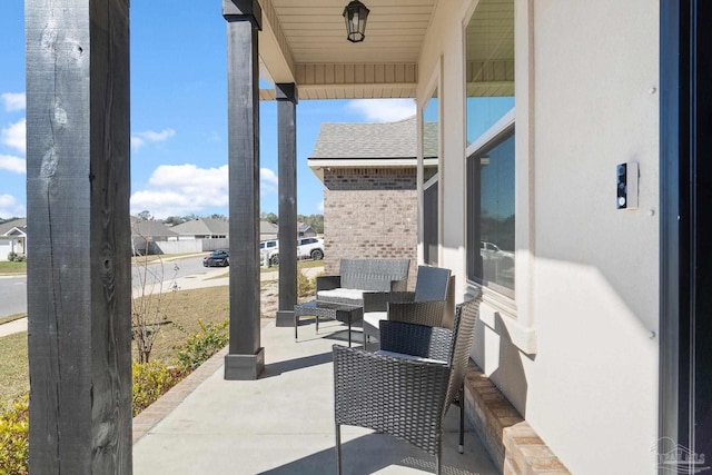 view of patio / terrace with a residential view