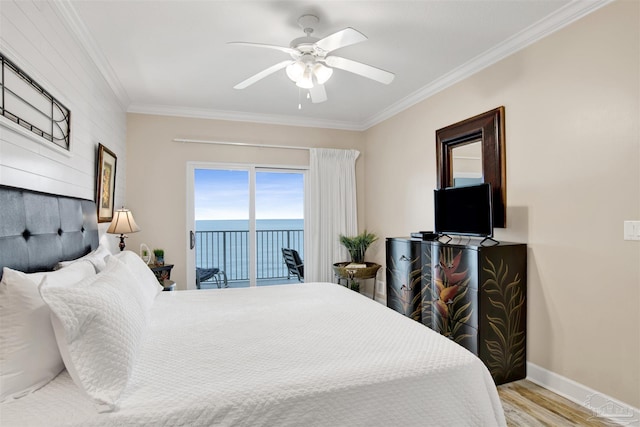 401 E Beach Blvd Unit 1207, Gulf Shores, AL 36542 - bedroom featuring access to exterior, crown molding, wood finished floors, ceiling fan, and baseboards