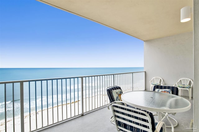 401 E Beach Blvd Unit 1207, Gulf Shores, AL 36542 - balcony featuring view of water and beach and outdoor dining area