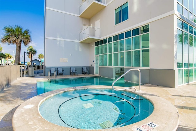 401 E Beach Blvd Unit 1207, Gulf Shores, AL 36542 - view of pool with a patio and a pool with connected hot tub