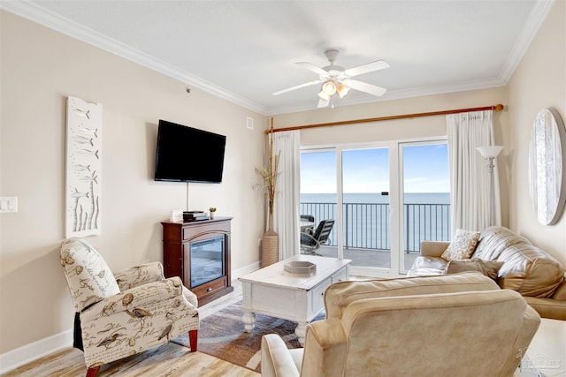 401 E Beach Blvd Unit 1207, Gulf Shores, AL 36542 - living area featuring ornamental molding, light wood finished floors, ceiling fan, and baseboards