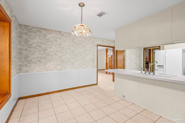 tiled spare room with sink