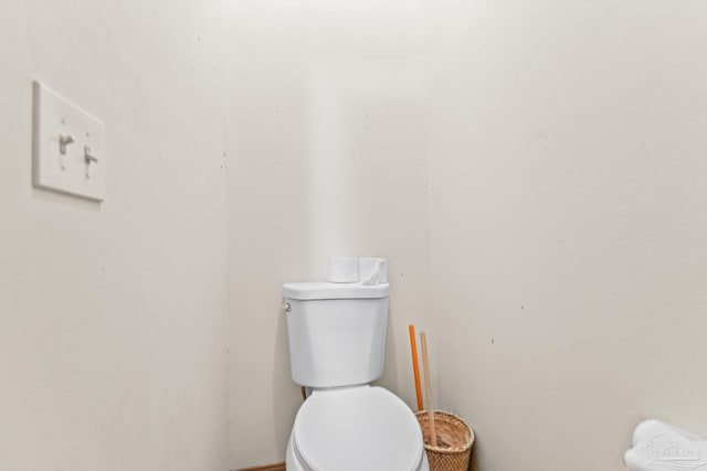 bathroom featuring toilet