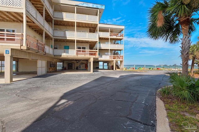 view of building exterior featuring a water view