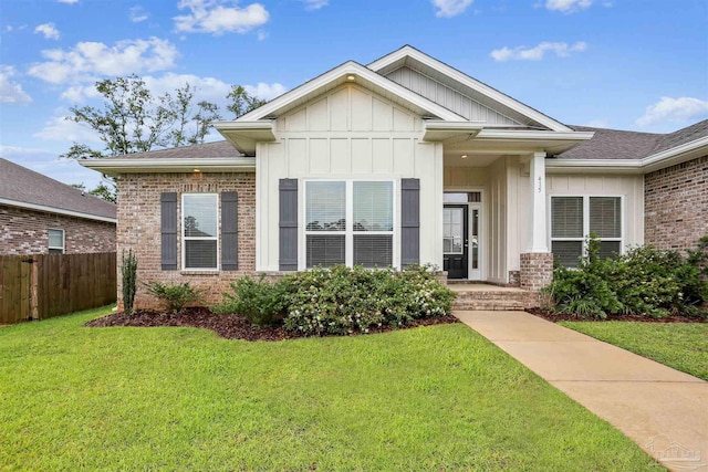 415 Broadleaf Cir, Cantonment, FL 32533 - craftsman inspired home with board and batten siding, brick siding, and roof with shingles
