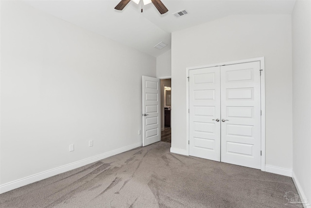 415 Broadleaf Cir, Cantonment, FL 32533 - unfurnished bedroom featuring carpet floors, vaulted ceiling, baseboards, a closet, and ceiling fan