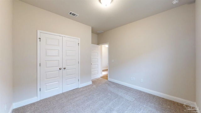 415 Broadleaf Cir, Cantonment, FL 32533 - unfurnished bedroom featuring carpet floors, a closet, and baseboards