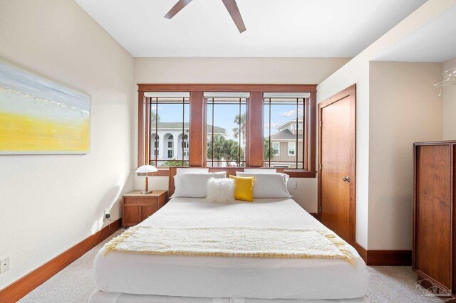 bedroom featuring ceiling fan and carpet flooring