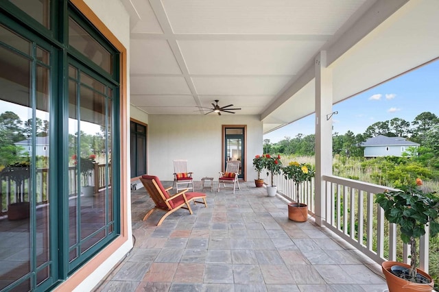 view of patio / terrace featuring ceiling fan